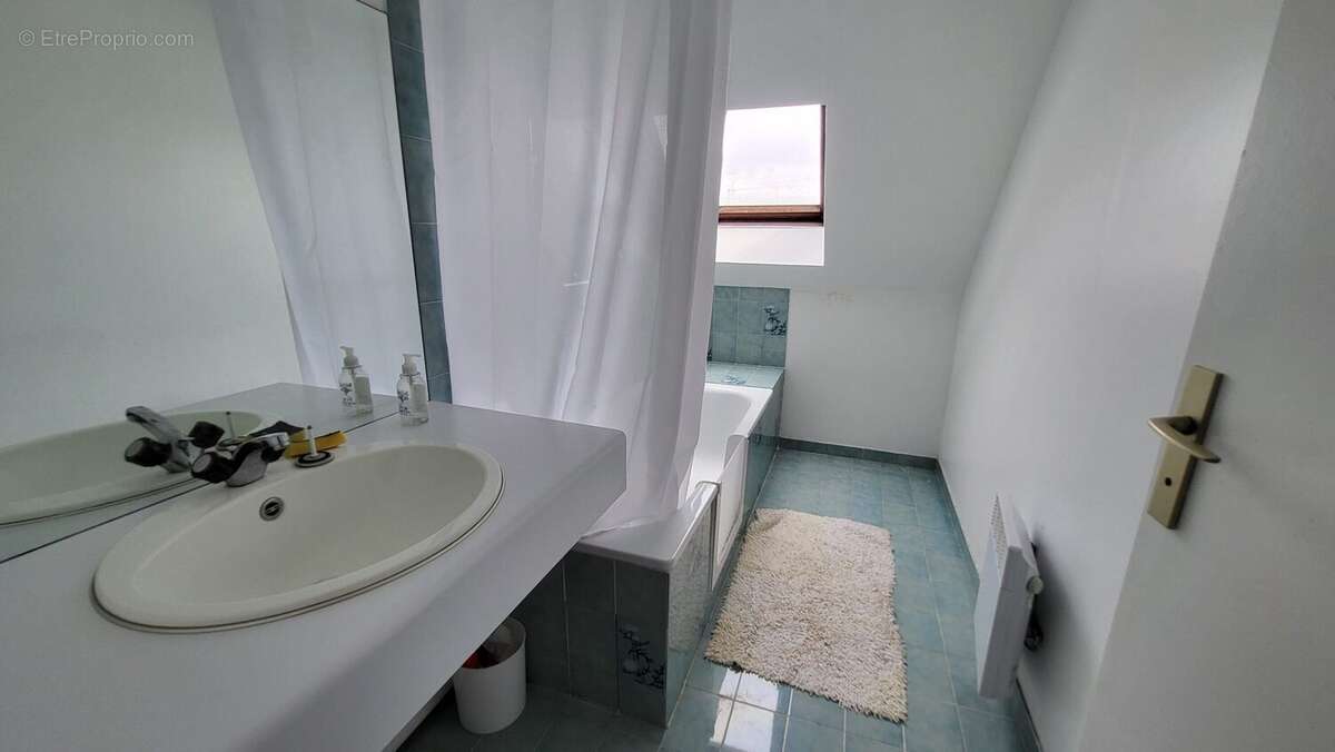 Maison 147 m² à Les Clayes-Sous-Bois  - photo 7