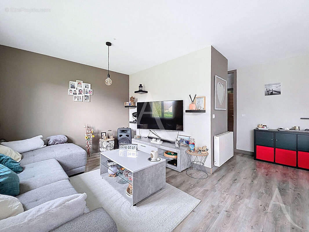 Maison de plain-pied 4 pièces avec sous-sol total et terrain de 650 m² à Rosny-sur-Seine - photo 3