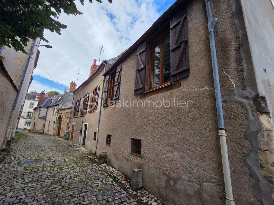 Magnifique appartement T3 de 101m² avec place de parking privative et cave en hypercentre ville de Nevers - photo 24
