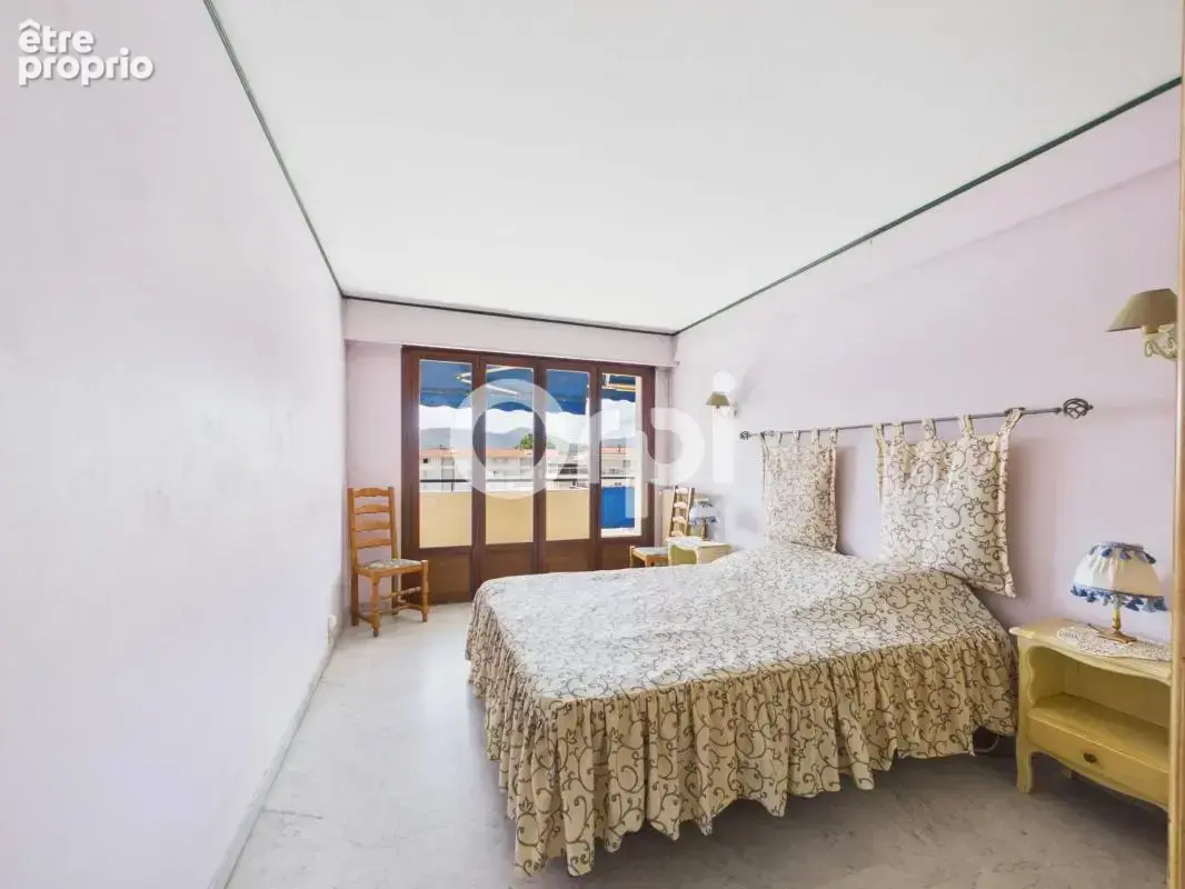 Appartement t3 - 86m2 - stationnement/ cave - centre ville - traversant - dernier étage - photo 10