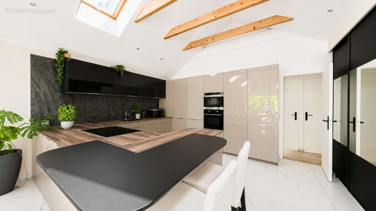 Maison 120 m² à Saint-Maur-Des-Fosses  - photo 7