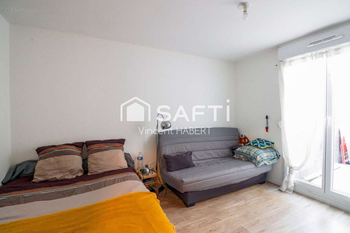 Photo 3 - Appartement à CHANTELOUP-LES-VIGNES