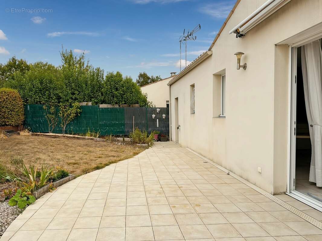Maison de plain-pied - 84 m² - jardin intimiste - photo 3