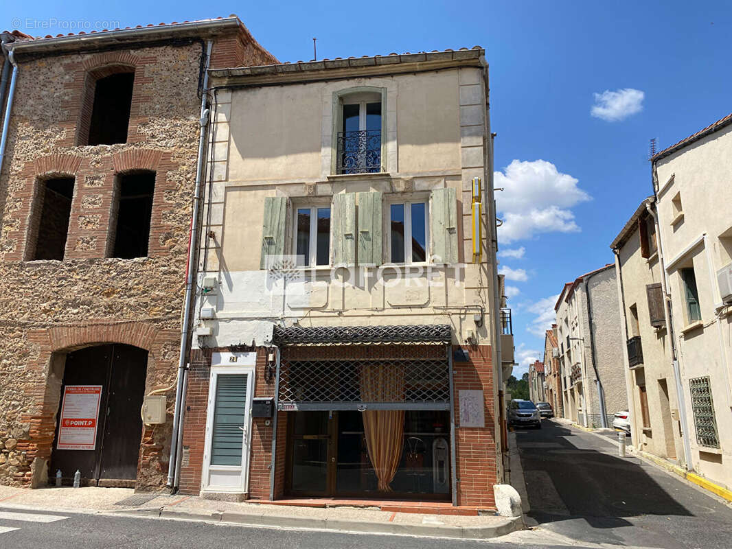Immeuble avec commerce et duplex. - photo 11