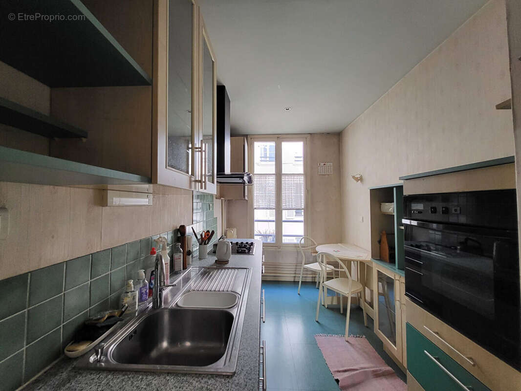Appartement 74m² 4 pièces 75010 Paris - photo 8