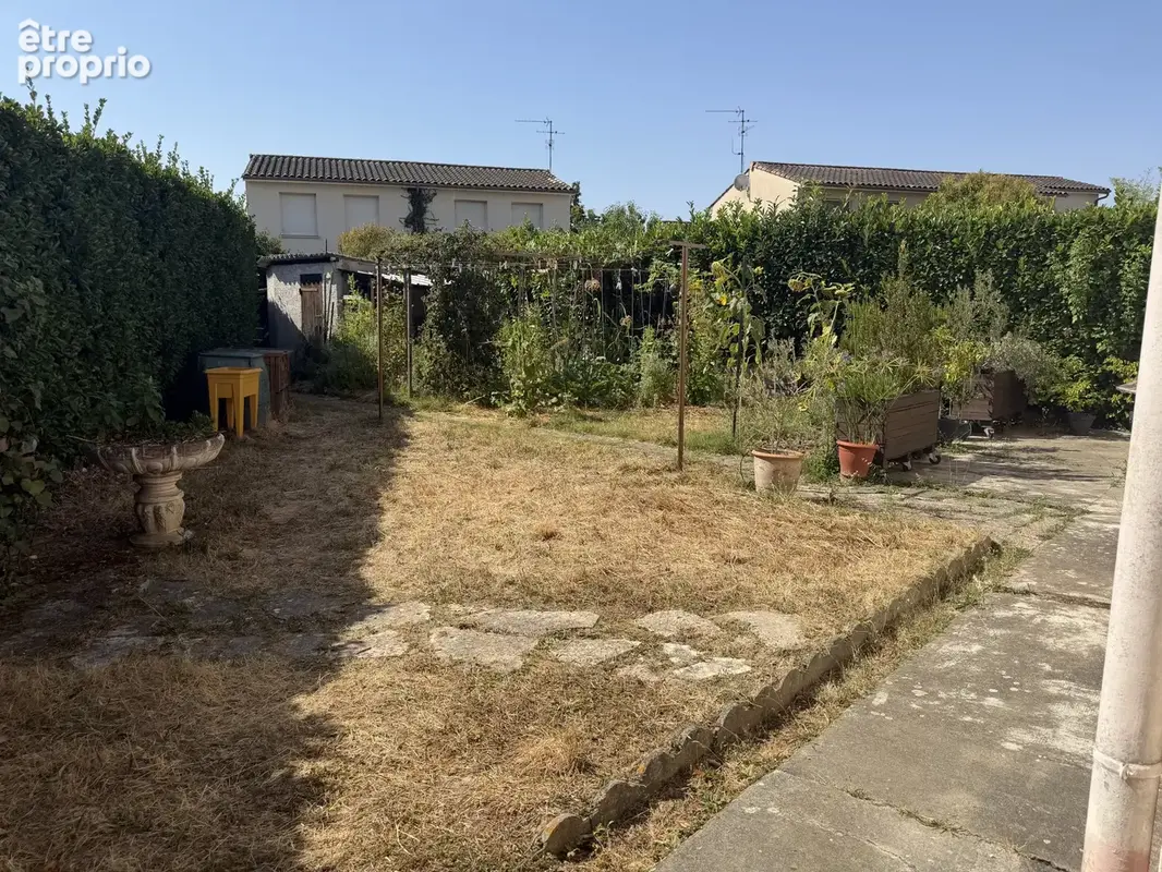 Maison T5 avec terrasses, abris jardin et garage sur un terrain de 440m2 - photo 8