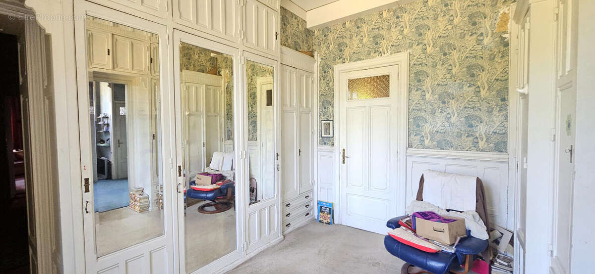 Exclu REMIREMONT – Appartement de caractère à rénover de 209 m²  avec jardin privatif+ 2 stationnements +  caves - photo 13