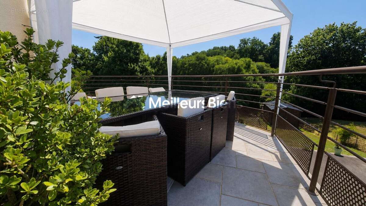 Maison 125 m² à Plumelin, 4 chambres, terrain de 1088 m² - photo 15