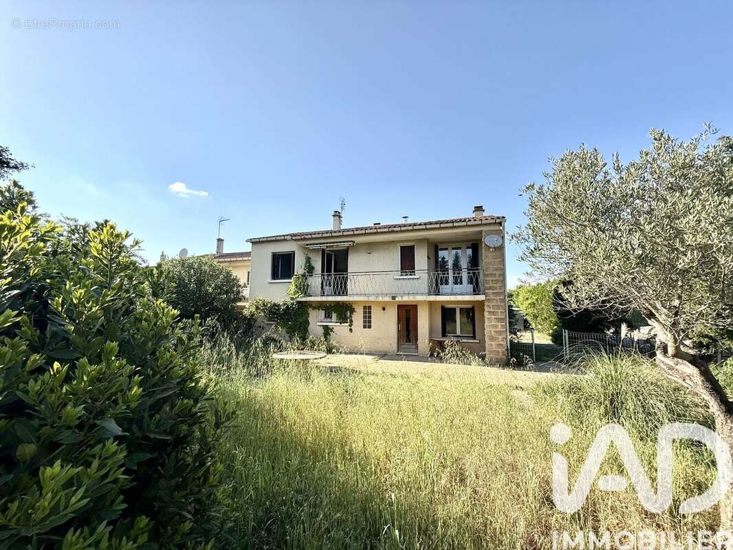 Photo 2 - Maison à LAUDUN-L'ARDOISE