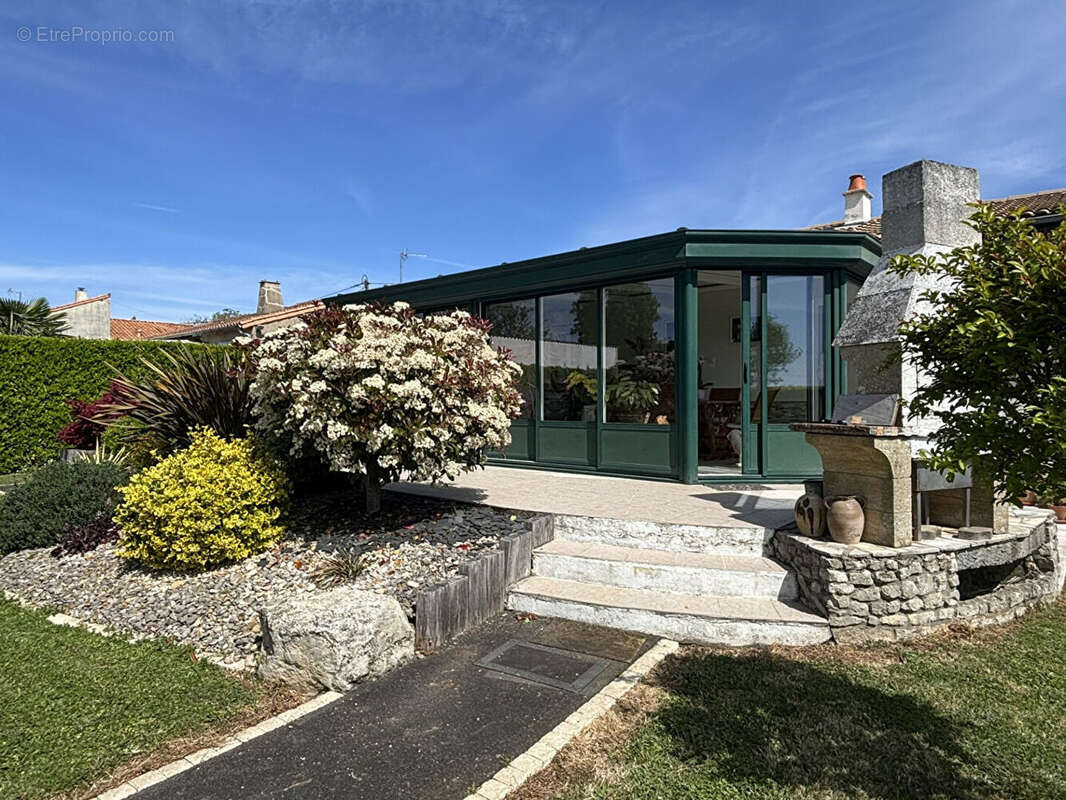 Maison de 118 m2 à Vouillé - photo 2