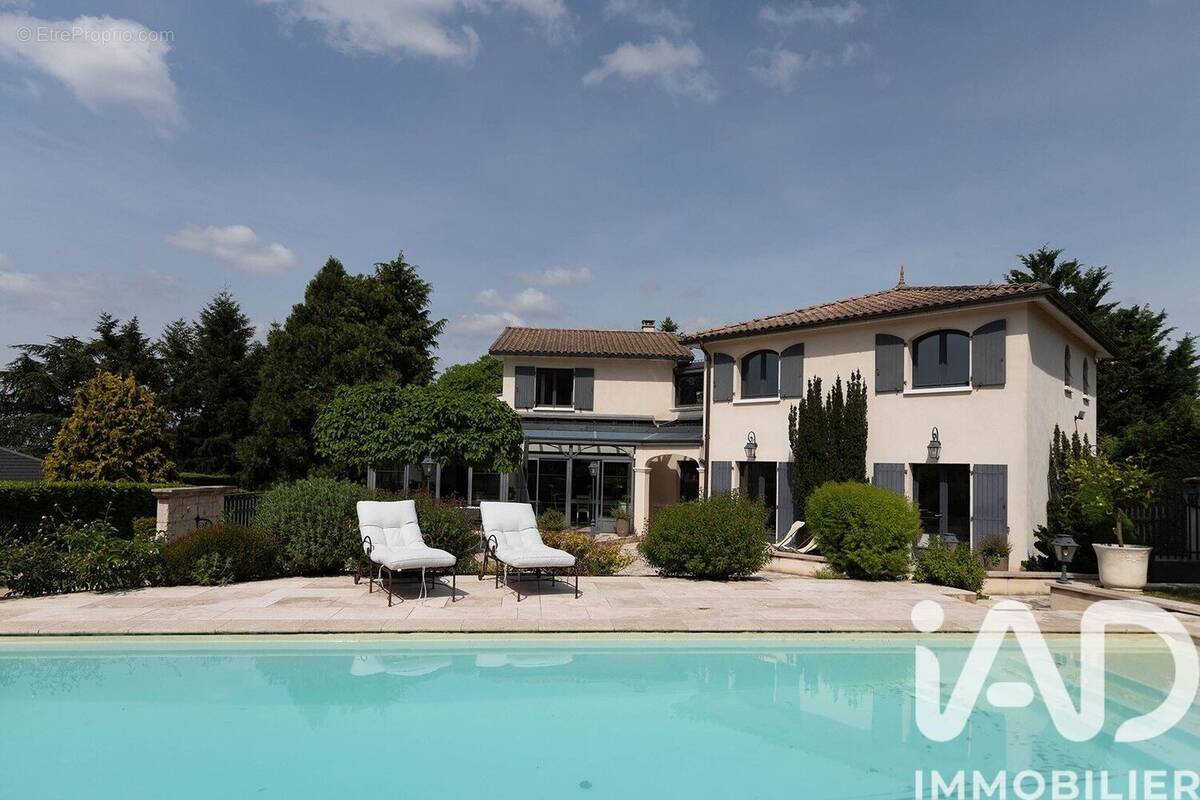 Photo 1 - Maison à LA TOUR-DE-SALVAGNY