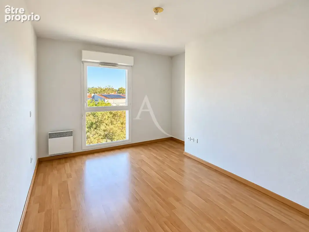 GRADIGNAN : Proche des commodités - Appartement T2 avec balcon et parking - photo 7
