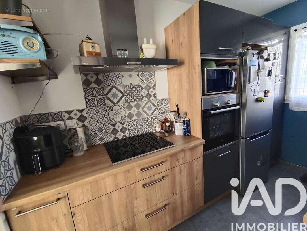 Maison 88 m² à Saint-Aubin-D'aubigne  - photo 7