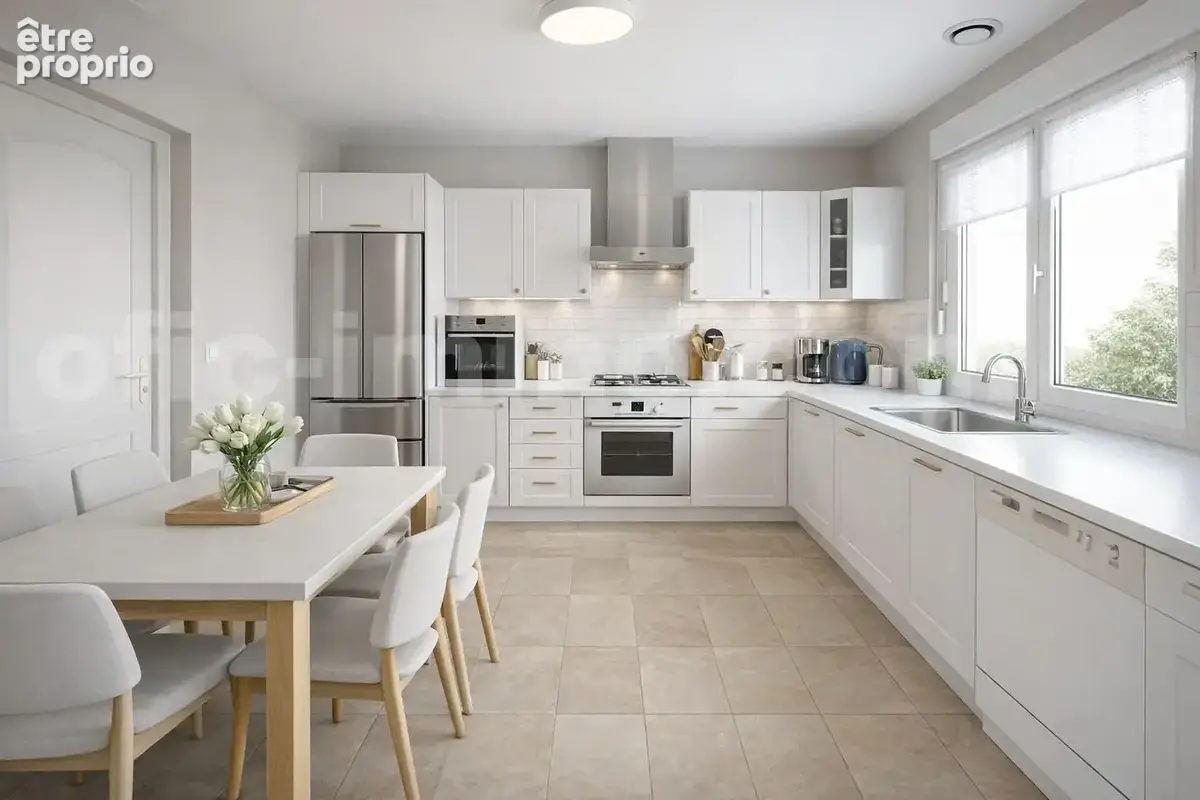 Cuisine lumineuse et moderne avec table à manger