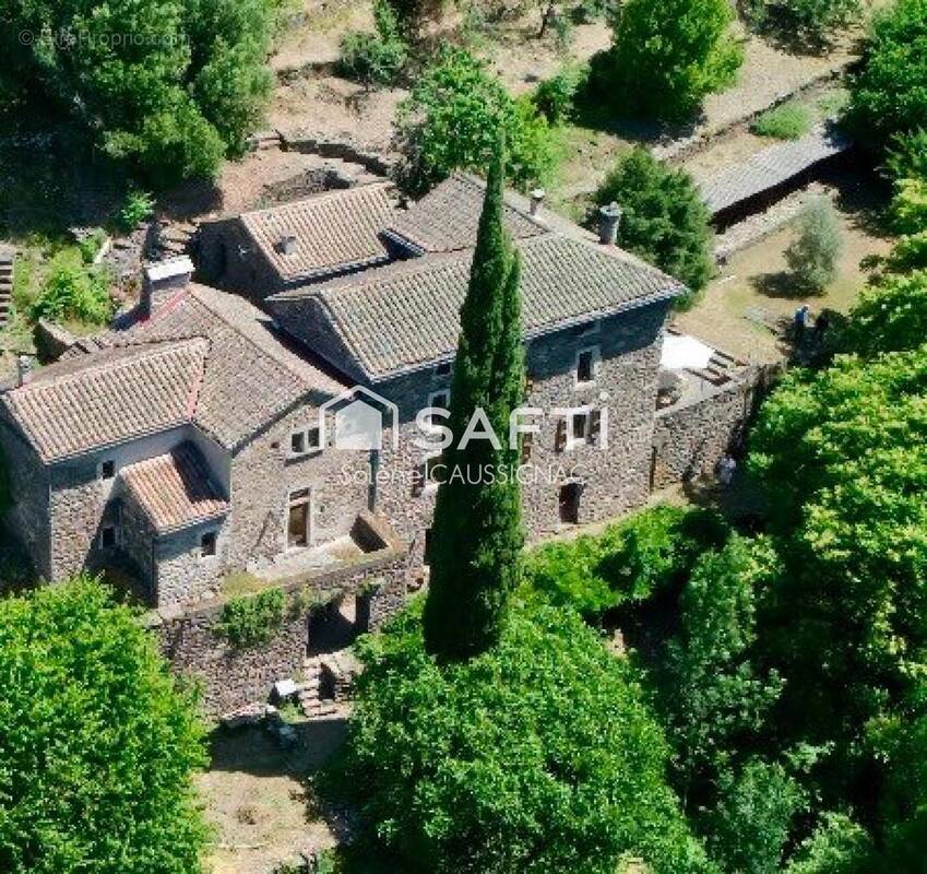 Photo 1 - Maison à LE COLLET-DE-DEZE