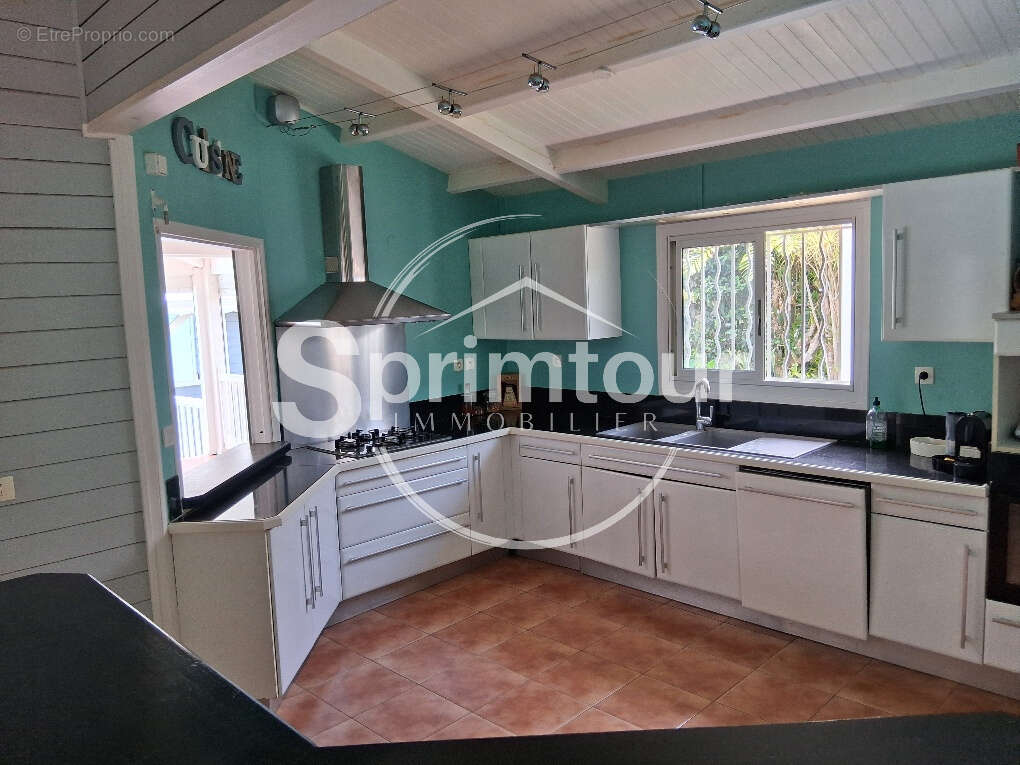 - BAIE-MAHAULT   secteur de Plaisance -belle villa en bois T4 avec piscine - photo 5