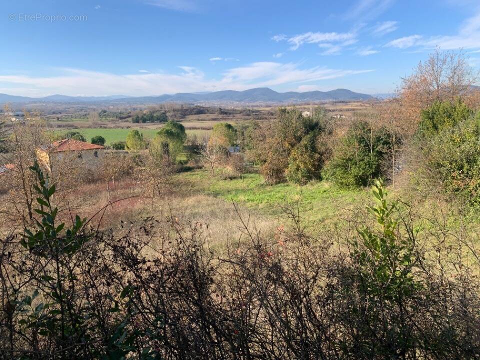 Terrain à SAINT-JEAN-DE-MARUEJOLS-ET-AVEJAN