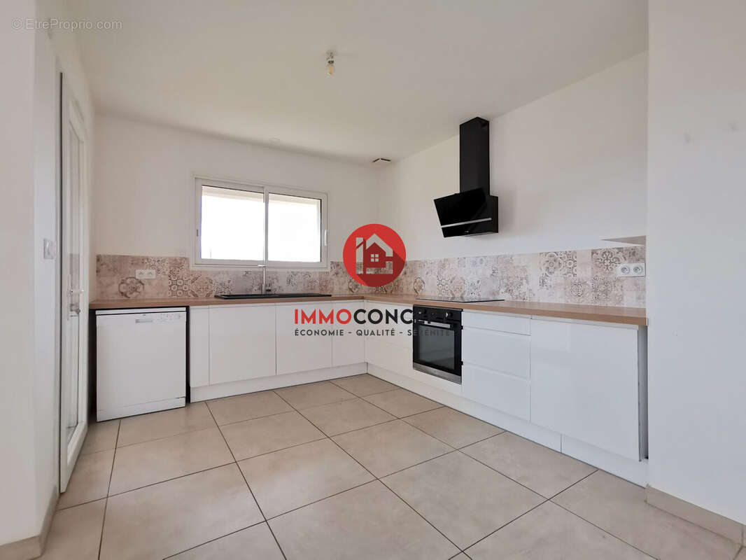 Maison à LAUDUN-L'ARDOISE