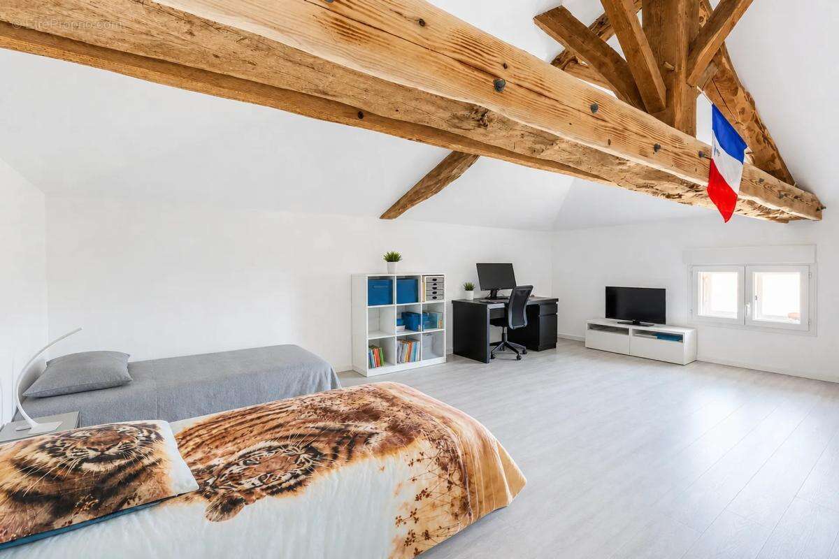 Villa en pierre rénovée avec garage à Vaulx-en-Beaujolais - photo 16