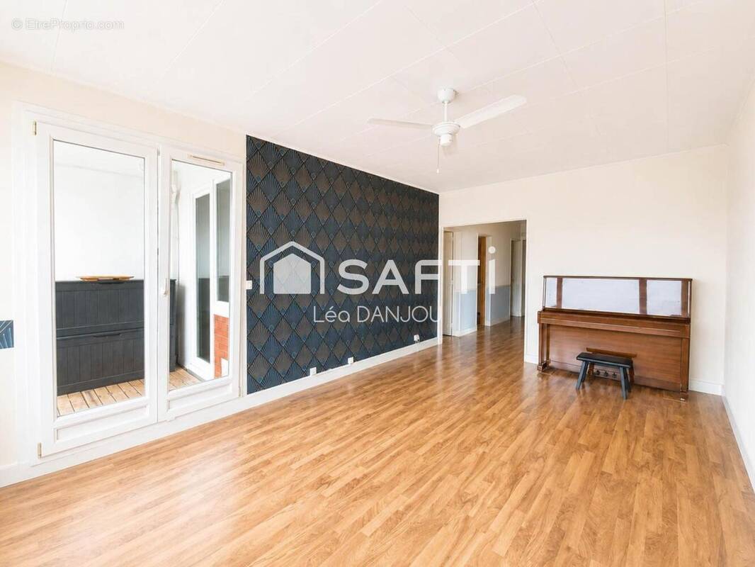 Photo 1 - Appartement à HEROUVILLE-SAINT-CLAIR