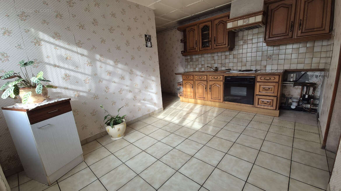 Maison à FOUQUIERES-LES-LENS