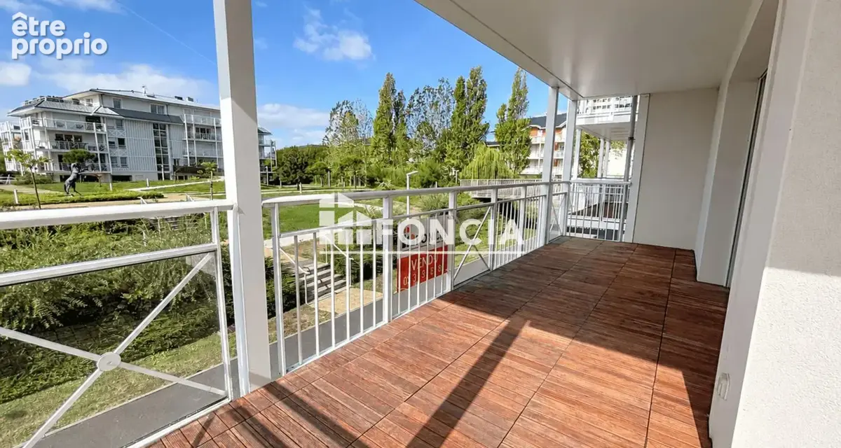Lumineux 2 pièces avec terrasse d'angle de 18 m² et vue dégagée - photo 2