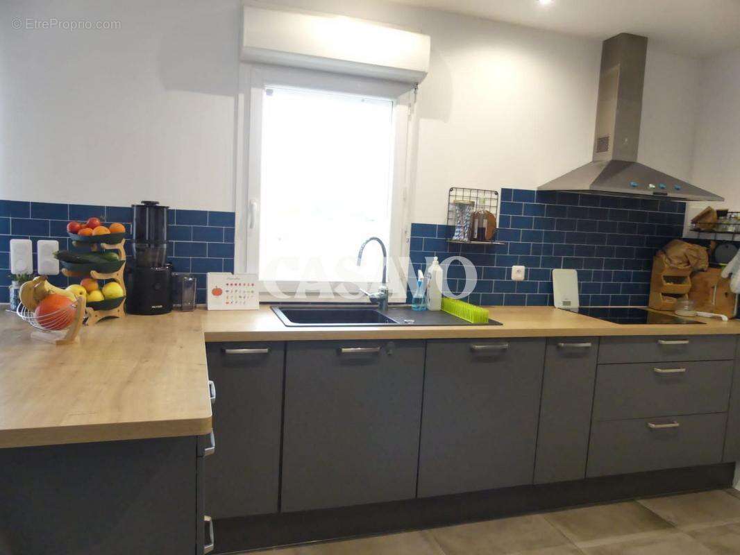 Maison à MOGNEVILLE