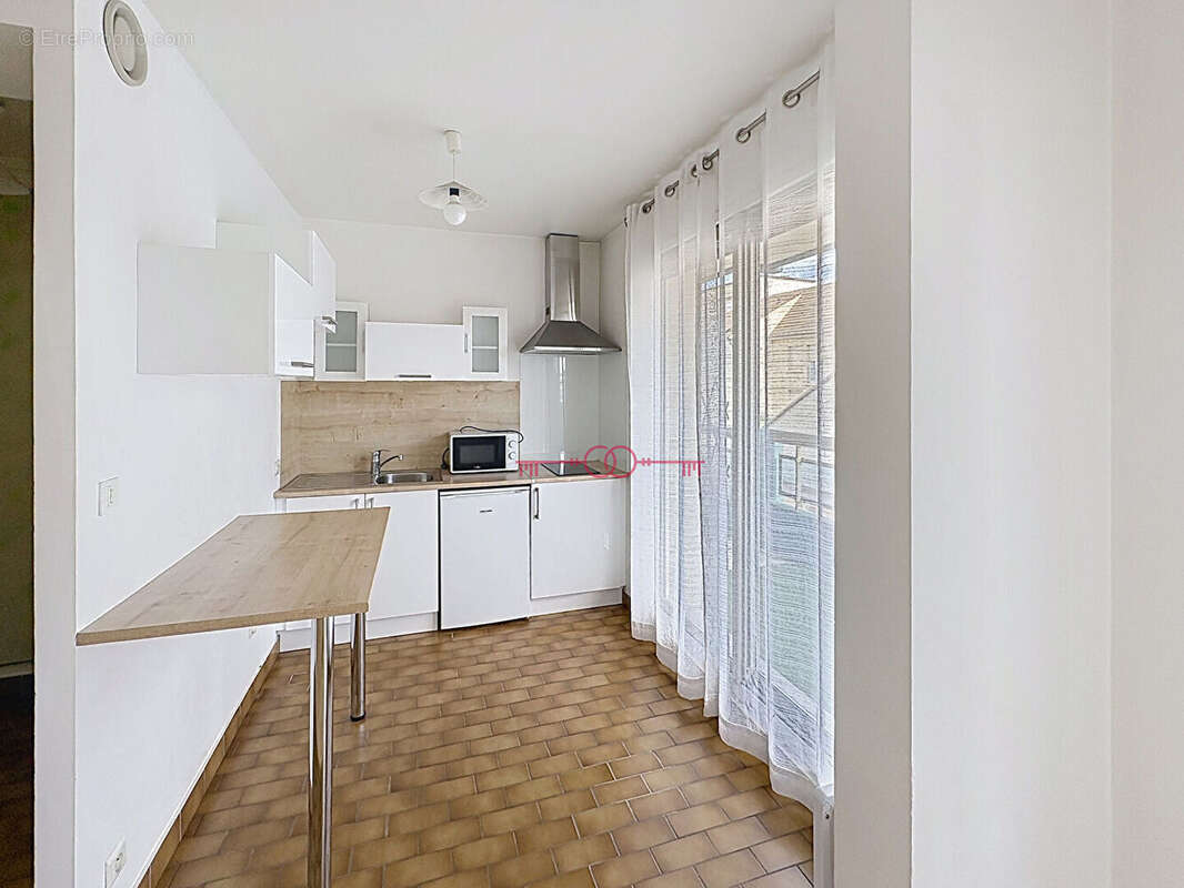 Appartement proche centre ville - 31 m2 - place de parking - garage - photo 2