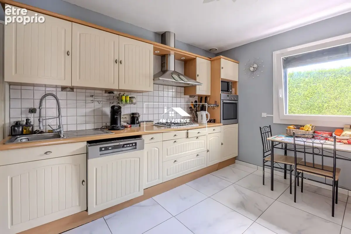 Maison semi-plain-pied 6 pièce(s) 150 m2 Ennevelin - photo 6