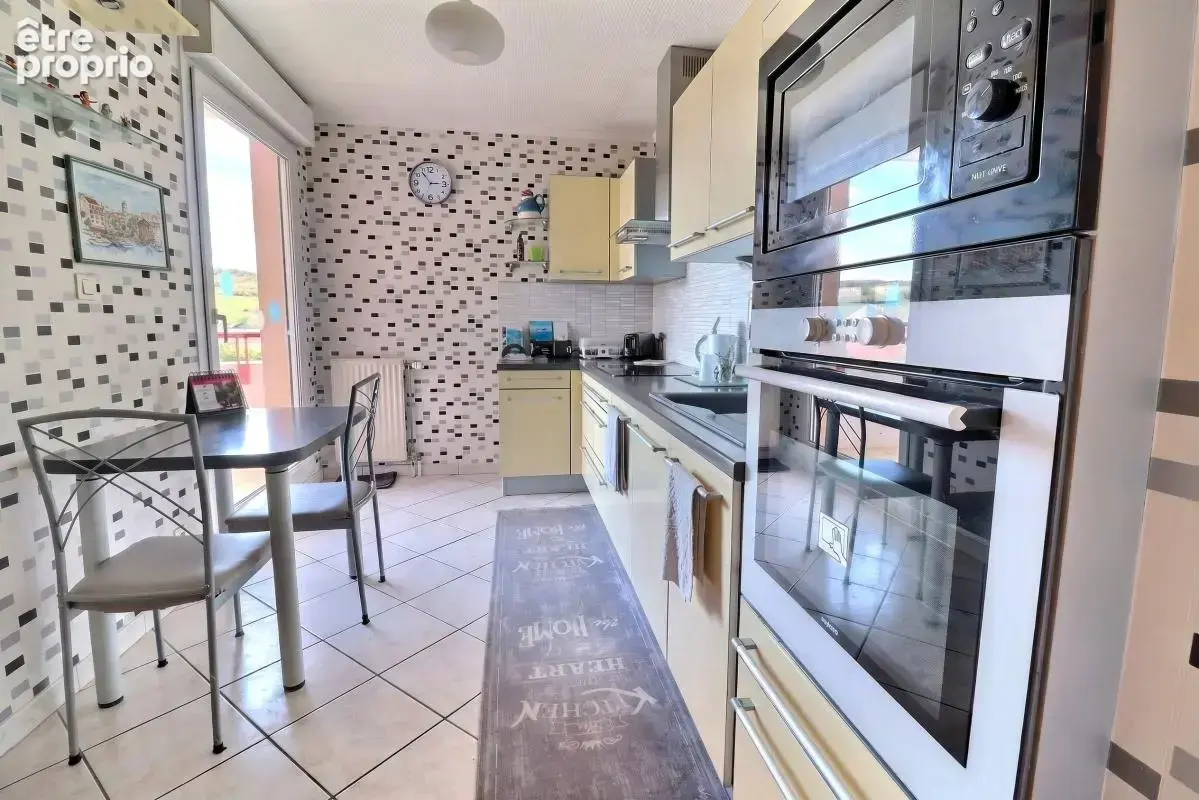 Appartement T5 3 chambres de 93 m², double balcon, ascenseur, garage et cave - photo 4