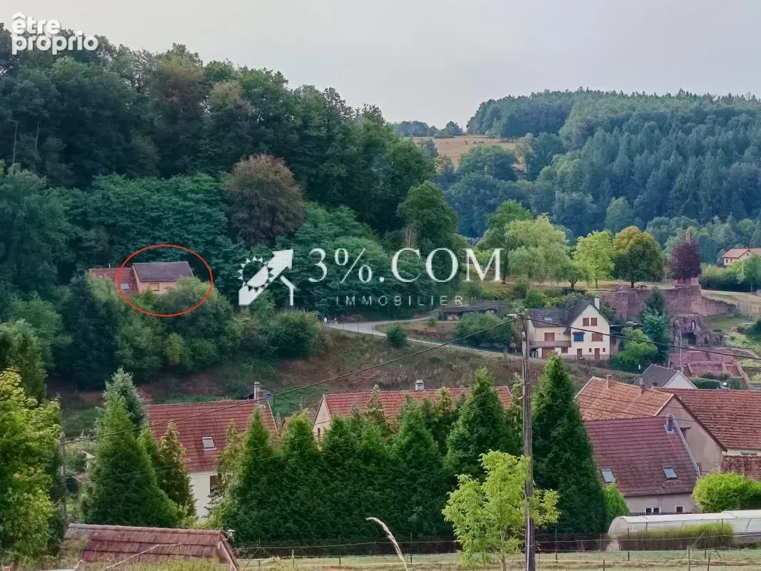 Maison sur les hauteurs avec terrain boisé - photo 3