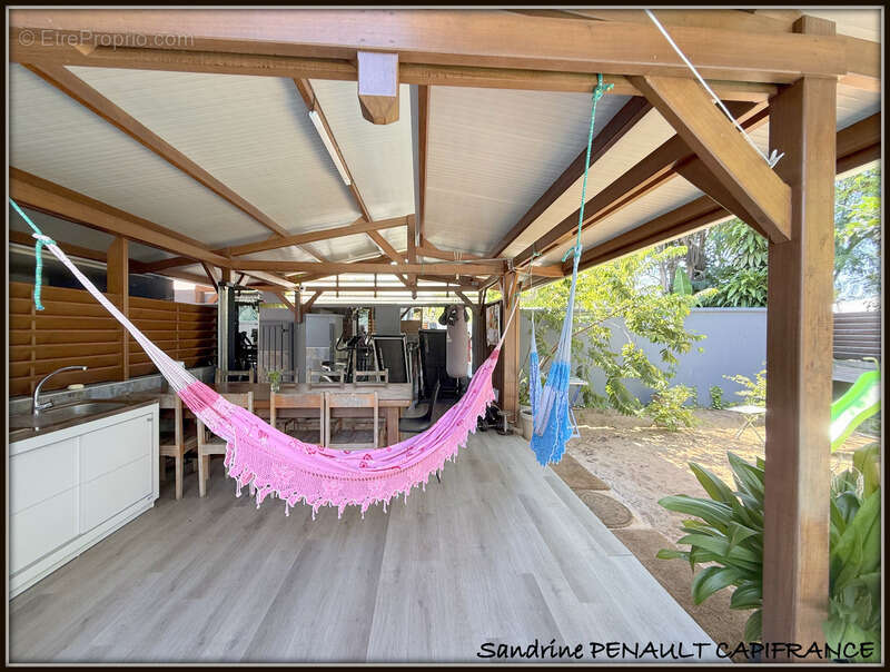 A vendre a kourou (97310) une magnifique villa t7 de 246 m² - avec 2 appartements t2 - terrain de 345 m² - au prix de 599 000 € - photo 7