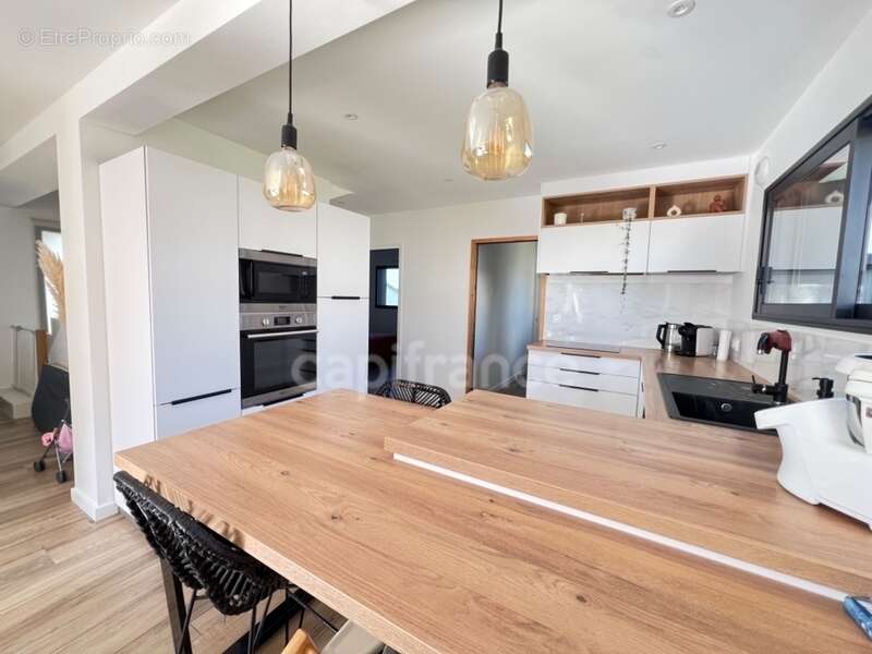 EXCLUSIVITÉ – Élégante maison contemporaine aux prestations soignées, à deux pas du bourg de Pommeret - photo 8