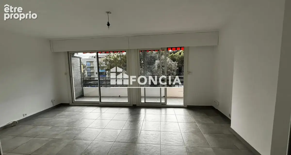 Appartement T2 TRAVERSANT - Centre-ville - photo 2