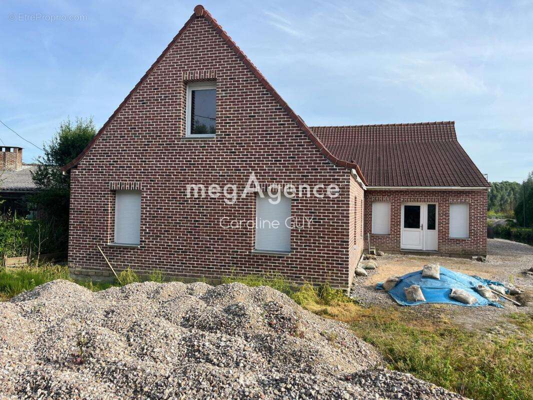 Propriété composée de trois habitations avec étang - photo 10