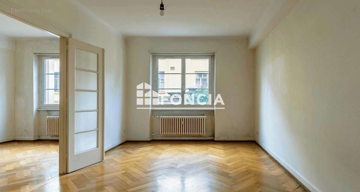 Appartement T3 de caractère à fort potentiel - Charme de l’ancien, beaux volumes - photo 5