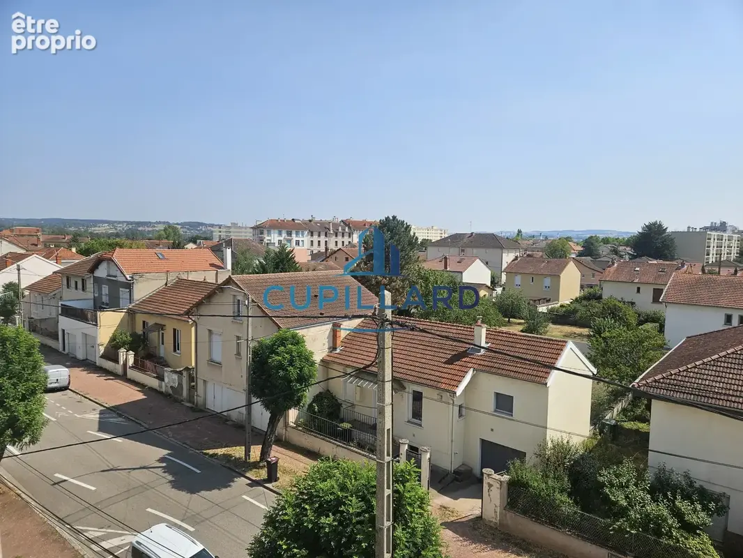 Appartement T4 avec balcon - cave et garage - Vue dégagée - photo 7