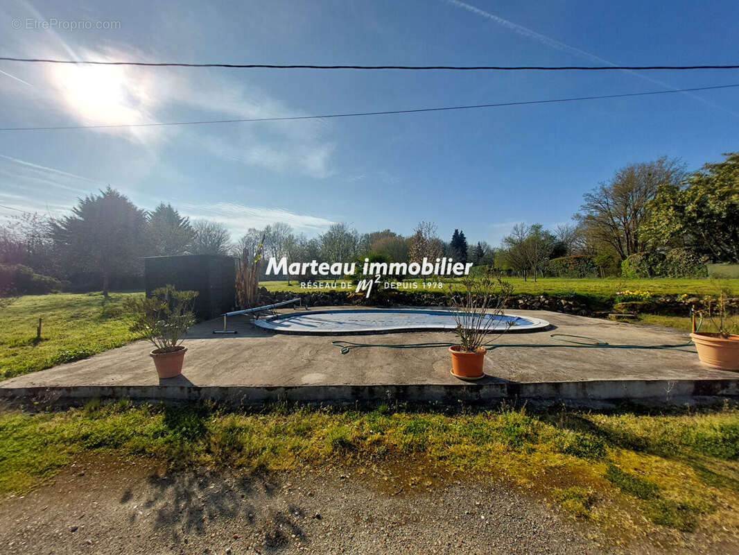 Maison à YVRE-L'EVEQUE