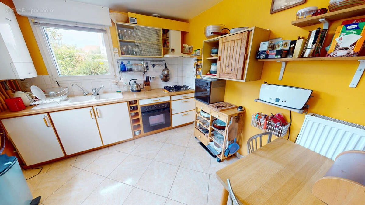 Maison à CORMELLES-LE-ROYAL