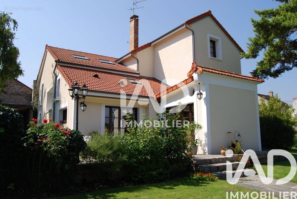 Photo 1 - Maison à GRIGNY