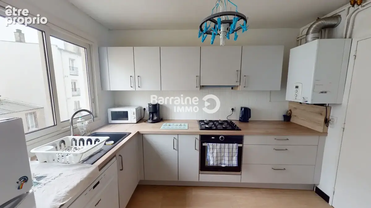 Exclusivite a vendre brest branda locataire en place appartement t5 4 chambres avec balcon ascenseur et parking sous-sol - photo 5