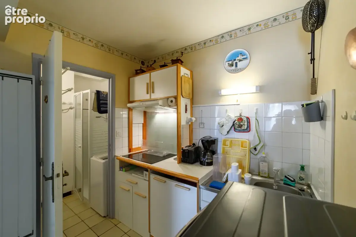 Appartement 2 pièces - place de parking intérieure et cave - 51000 euros - photo 2