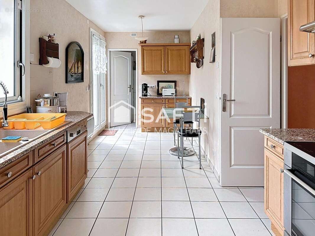 Photo 3 - Maison à VOISINS-LE-BRETONNEUX