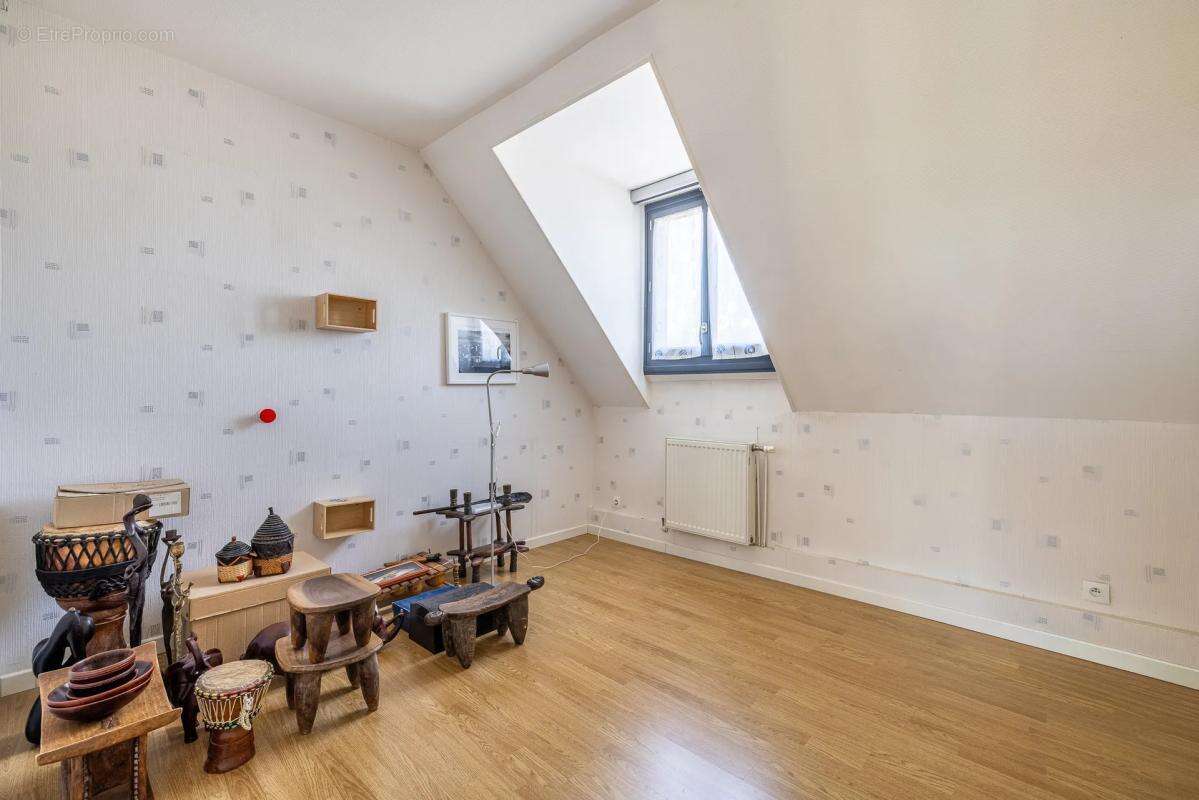 Maison de 5 pièces de 123 m² située à Lisses - photo 10
