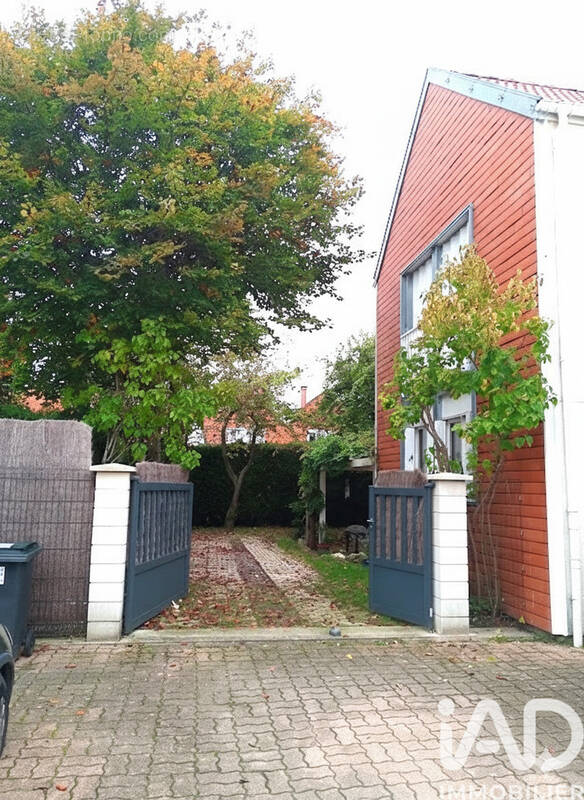 Photo 1 - Maison à VOISINS-LE-BRETONNEUX