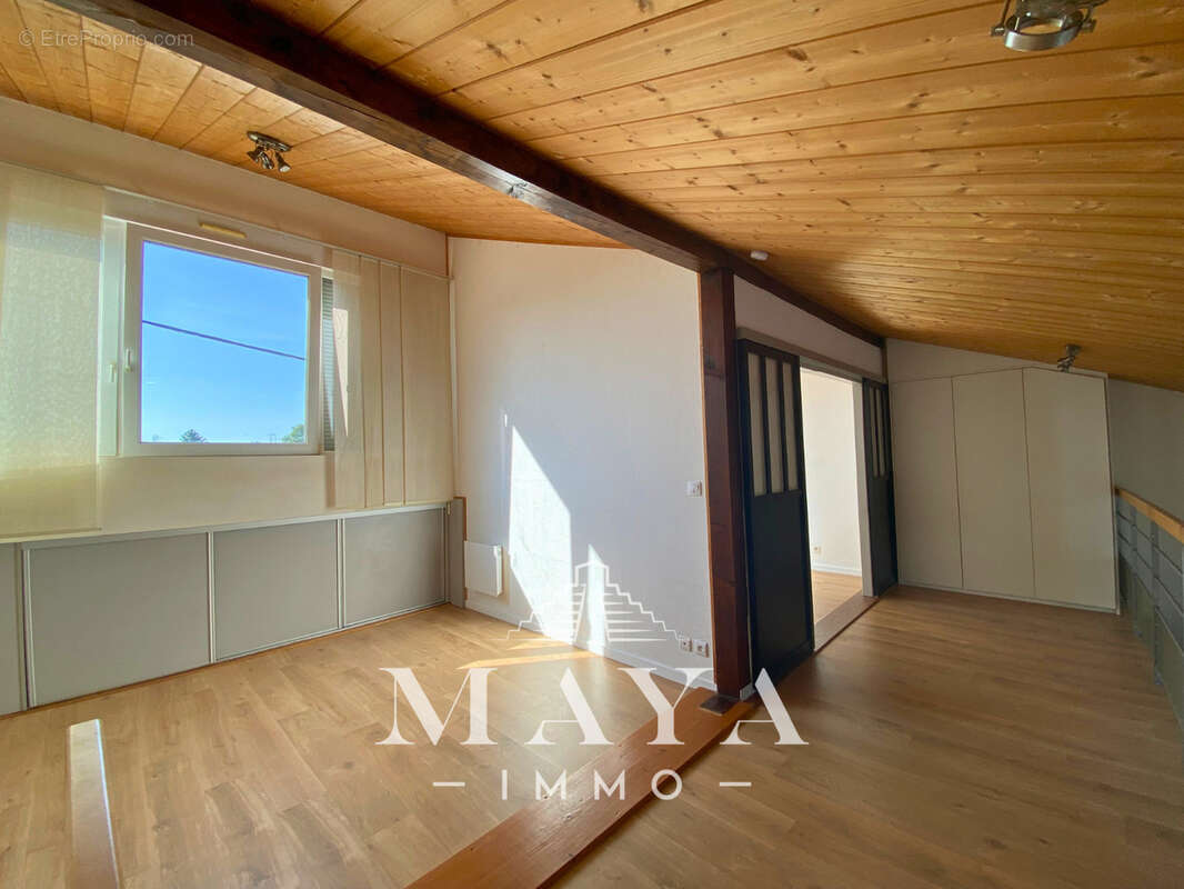 Appartement F3 en Duplex avec parking - photo 7