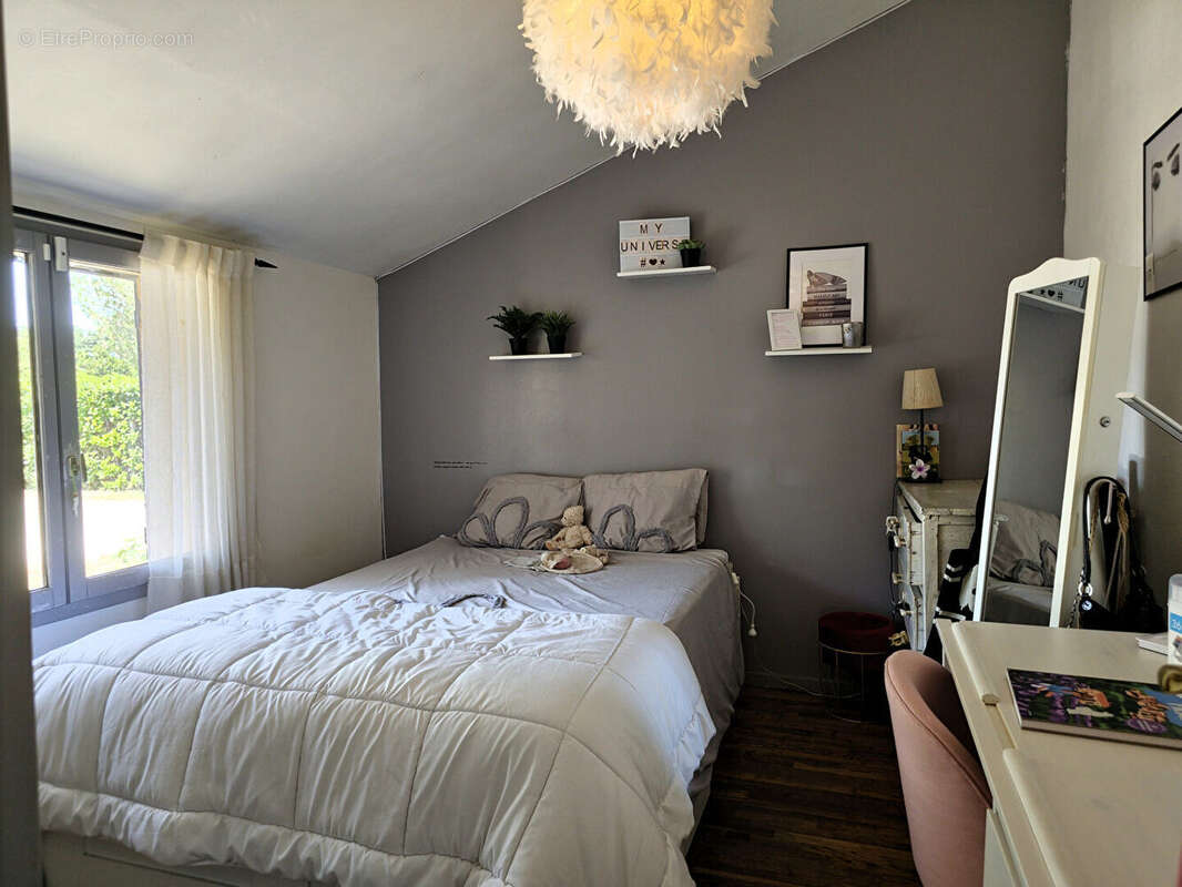 Maison familiale avec 3 chambres et jardin intimiste, proche commerces à Lavernose-Lacasse - photo 7