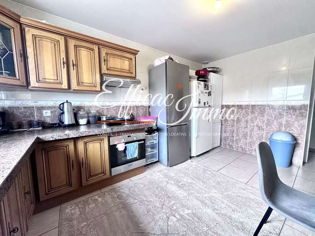 Appartement t4 de 97,06 m² – balcon – box privatif - photo 5