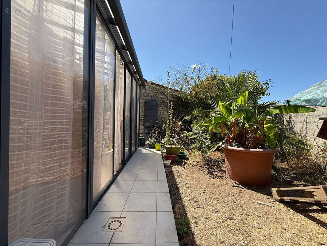 Maison 55m² à villeneuve-la-comtesse - photo 11