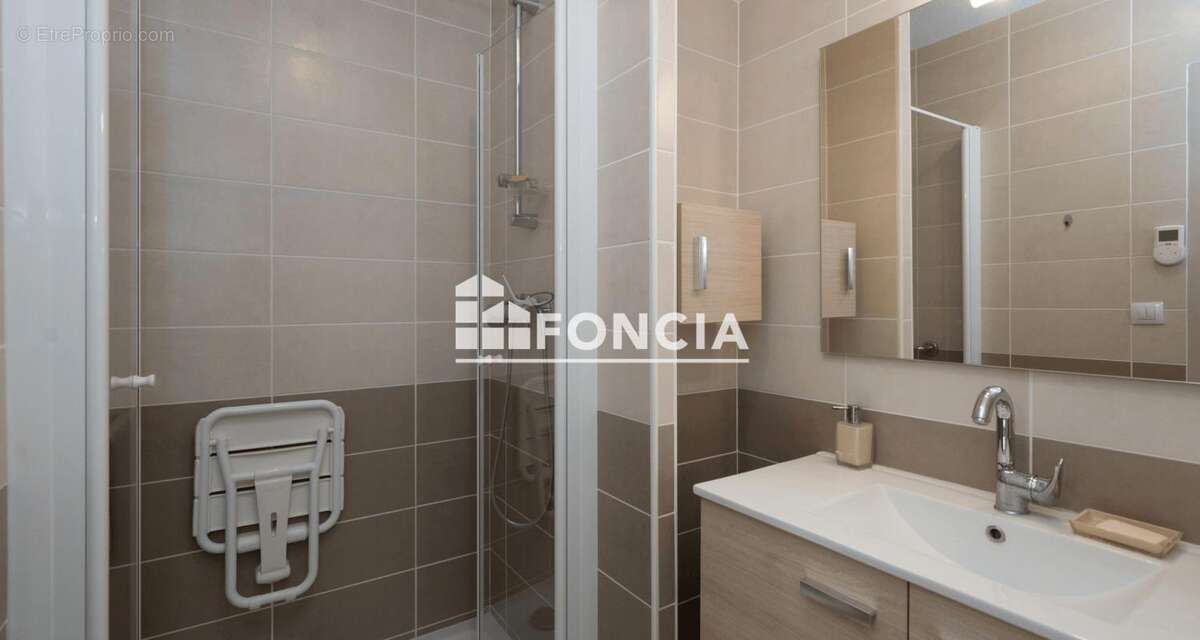 TAIN L'HERMITAGE, place du Taurobole, agréable appartement de 93.55 m2 avec garage - photo 7